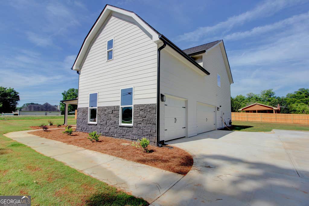 Photo of 23 Woodland Road, Covington, GA 30016 (MLS # 10831023)