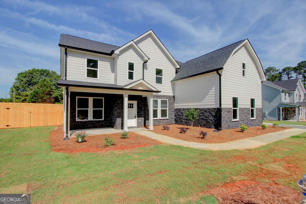 Photo of 23 Woodland Road, Covington, GA 30016 (MLS # 10831023)