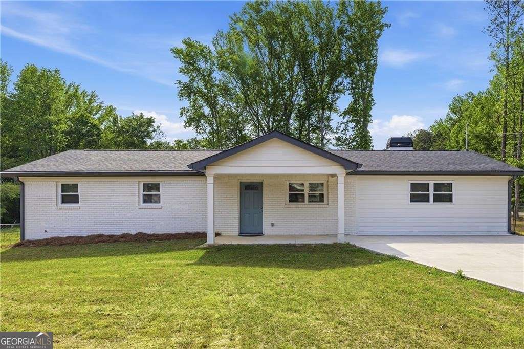 Photo of 8561 Hickory Lane, Lithia Springs, GA 30122 (MLS # 10739392)