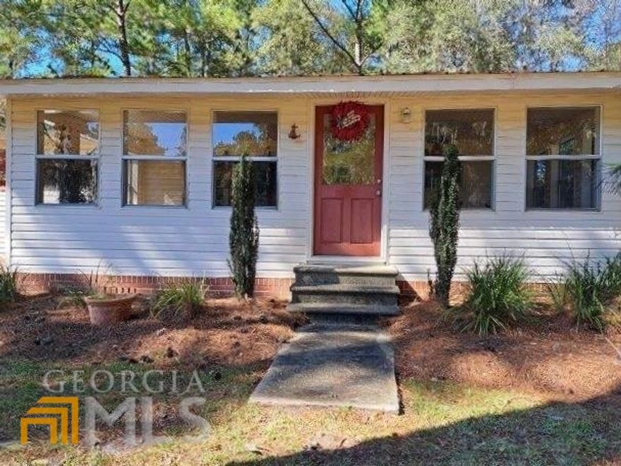 SHELLMAN BLUFF SPECTACULAR!!! Don't miss your opportunity to be a Hidden Coast Homeowner!! This 3 Bedroom/ 2 Bath Home comes FULLY FURNISHED with plenty of room for all your guests. Great for use as an INCOME PROPERTY, SECOND HOME, or RESIDENCE. Whether hosting a low country boil in the detached 572 sq ft garage, set up for large parties, or sipping your morning coffee on the sun porch before trolling your way down the river toward the Atlantic for your day of offshore fishing, this house has you covered!! Come HOME to this UNIQUE fish camp village nestled amongst the moss covered oaks! Call today to schedule a tour. Original structure was added onto in 1992 increasing the square footage to the current.
