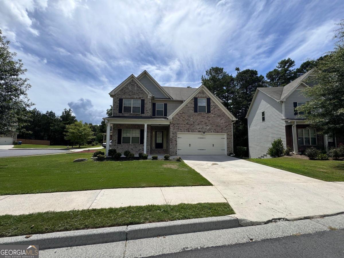 WELCOME HOME! This beautiful 7 bed & 4 full bath home is on a FINISHED BASEMENT! The dining room is detailed with a trey ceiling & panel trim. This spacious open concept leads right into the family room, featuring coffered ceilings & a cozy fireplace! The Kitchen features solid surface countertops & a spacious pantry. A full bed & bath on the main level is perfect for an office, play room, or guest room! The second level of the home features an open loft space that would make a great library, home theatre, or gaming station! There are 3 additional bedrooms on the upper level. This master bedroom includes a trey ceiling with tons of natural light! With a spa like master bathroom featuring a double vanity with a separate shower & tub! The finished basement is the perfect space for entertaining! **STOCK IMAGES OF DECORATED MODEL HOME** THERE WILL BE PICTURES OF HOME EXTERIOR THAT ARE THE ACTUAL HOME ** NO SIGN!!!! BRING YOUR BUYERS TODAY Co THIS WILL NOT LAST!!