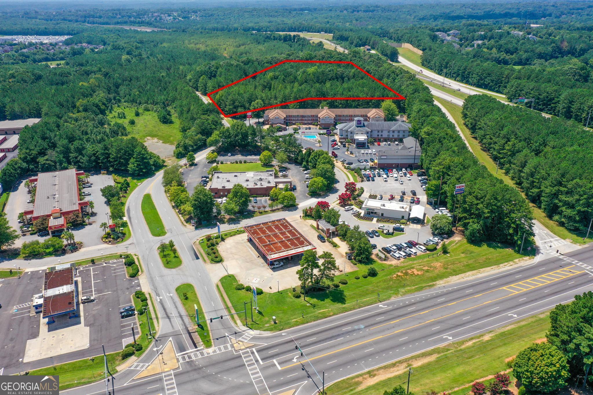 ***Major Price Improvement*** Prime Hospitality Development Opportunity in Stockbridge, GA The Christian Swann Group is excited to present aunique opportunityto acquire 3.91 acres of prime landlocated at 7495 Davidson Pkwy N, Stockbridge, GA. This strategically positioned parcel is ideal for hospitality development, offering a perfect blend of accessibility and market potential. **Property Highlights** Size and Location: This expansive 3.91-acre site is situated in a high-traffic area of Stockbridge, ensuring excellent visibility and accessibility for guests. Its proximity to major highways and local attractions makes it an attractive location for both leisure and business travelers. Zoning: The property is zoned for commercial use, allowing for a variety of hospitality developments, including hotels, motels, and resorts. This flexibility opens the door to numerous development possibilities tailored to meet market demands. **Market Potential** Growing Demand: Stockbridge is experiencing significant growth, with an increasing number of visitors drawn to the area for its attractions and business opportunities. This trend presents a compelling case for investing in hospitality services to meet the rising demand for quality accommodations. Community Impact: Developing this property will not only enhance the local hospitality landscape but also contribute to the community by creating jobs and supporting local businesses. **Investment Benefits** Strong Return on Investment: With the ongoing growth in the region and the demand for hospitality services, this property promises a robust return on investment for savvy developers and investors. Expert Support: The Christian Swann Group offers comprehensive guidance throughout the acquisition and development process, ensuring a smooth transition from concept to reality. This is a rare opportunity to secure a prime piece of hospitality land in Stockbridge, GA. Whether you are looking to expand your portfolio or enter the hospitality market, this property provides an excellent foundation for success. Contact us todayto learn more about this exceptional listing and how we can assist you in bringing your vision to life.