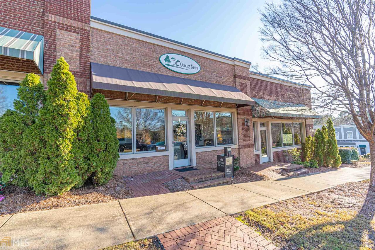 Wonderful 1316 SF office condominium space available in Lake Oconee Village, down from the Publix Supermarket. Open reception area, 3 offices plus a large conference room. Great location with good visibility by Publix and the movie theater. Carpeted throughout, and layout that would work for many businesses. One of the few walk in ready offices available for sale in the Lake Oconee Area. A very low maintenance office condo!