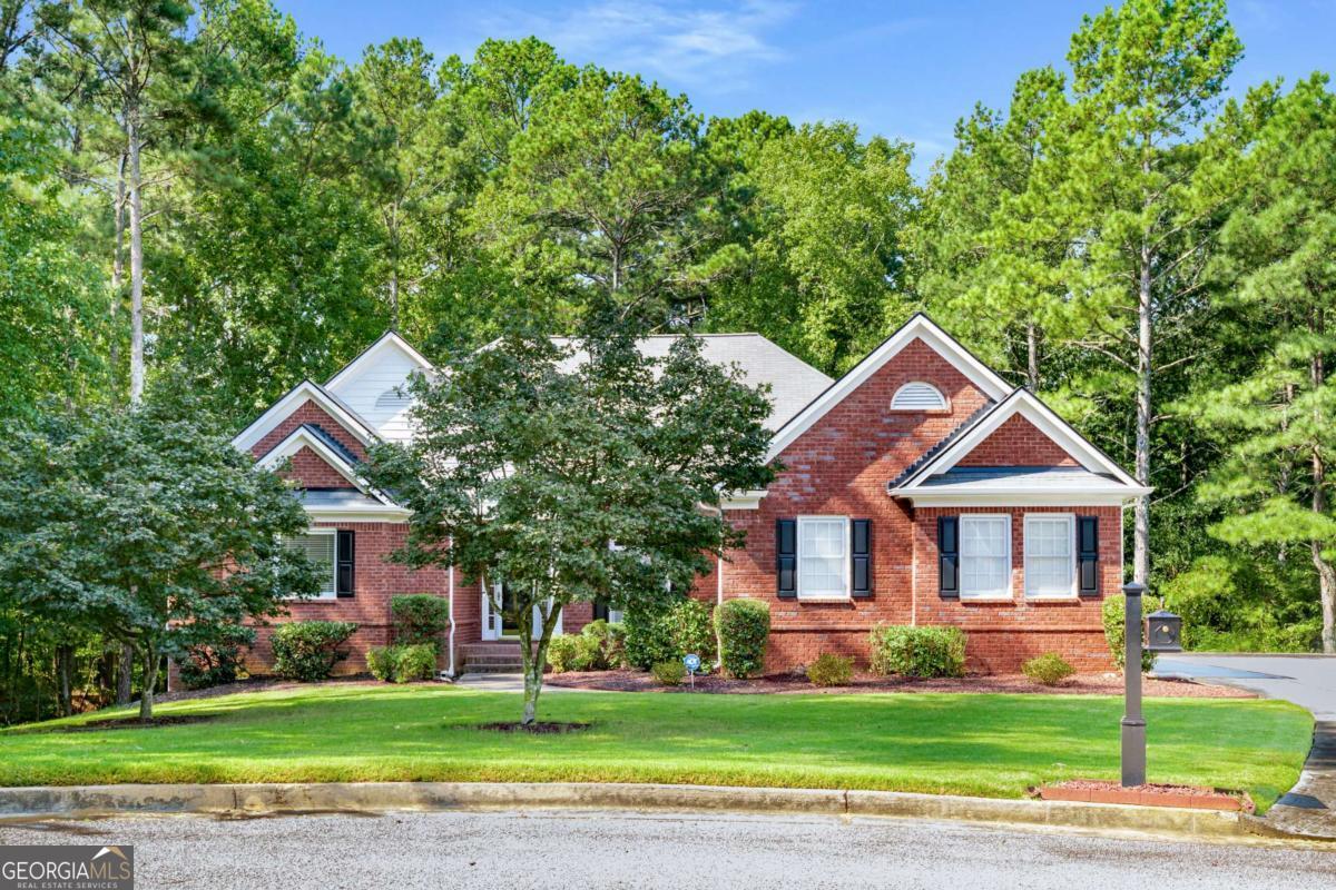 Welcome Home, Look No Further! This stunning 4BR/3.5BA brick ranch on a full basement is located in The Oaks Brentwood swim and tennis community. Customized to the owner's request, you will love this John Weiland built home. This beautiful one owner home is well maintained, and boasts a spacious floor plan that is ideal for families, relaxation, and entertaining. As you enter the home, you are greeted by gleaning hardwood floors in the foyer, dining room, kitchen, family room, and hallways. The kitchen offers new stainless steel appliances, quartz counters, tile backsplash, and a separate eat-in kitchen area easily accessible to the family room, enclosed climate controlled sunroom, and expansive deck. 3 sizable bedrooms and 1.5 bathrooms accompany the master suite on the main level. A pleasant surprise awaits you as you descend to the finished basement that is complete with: boat/storage room with garage door, flex room, media room, game room, kitchen, wet bar, and full bathroom. The outdoor living spaces are very captivating and includes an upper deck and lower level patio that provide views & access to the large backyard that is also perfect for entertaining, relaxing, and gardening. This home offers great curb appeal with its professionally landscaped yard that is situated on 0.55 acres at the center of a cul-de-sac, offering privacy and reduced through traffic. Close proximity to shopping, dining, and entertainment options. Great location and close to restaurants, shopping, and schools. This home is truly move-in ready and awaits it's new owner. Don't miss this one! 100% FHA Loan financing available with Ameris Bank.