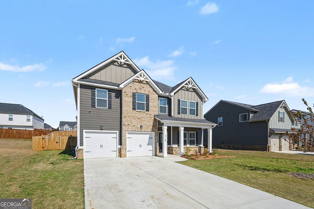 Photo of 318 W Sandy Creek Drive, Covington, GA 30014 (MLS # 10717400)
