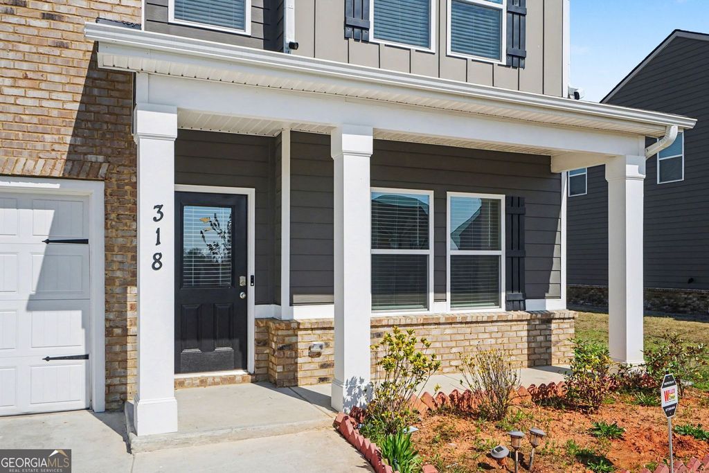 Photo of 318 W Sandy Creek Drive, Covington, GA 30014 (MLS # 10717400)