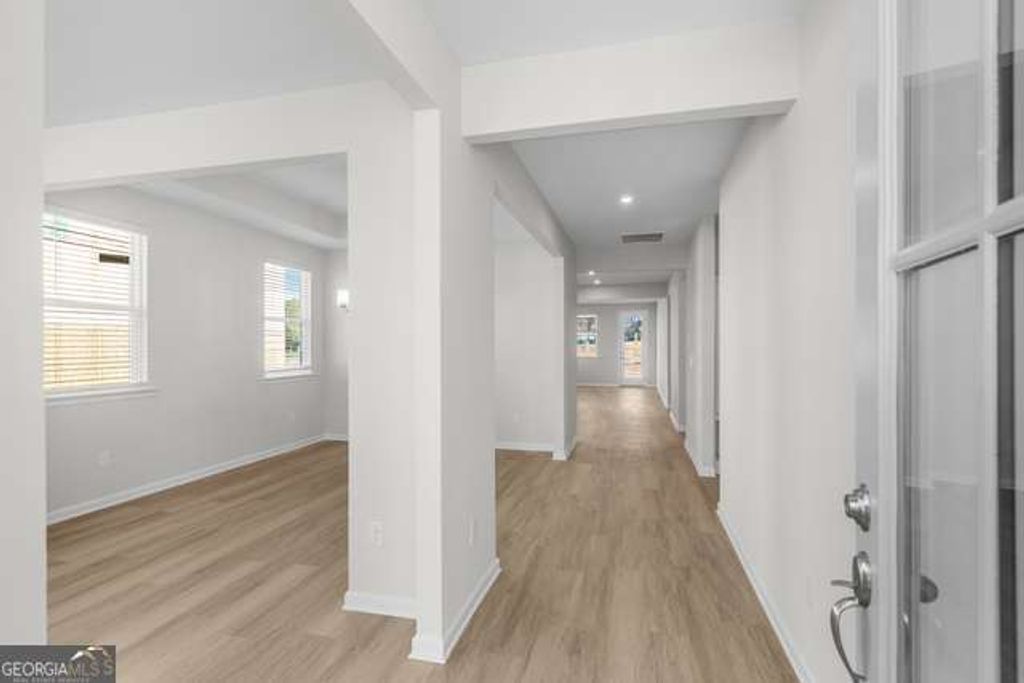 Photo of 521 Grand Wehunt Dr, Hoschton, GA 30548 (MLS # 10735679)