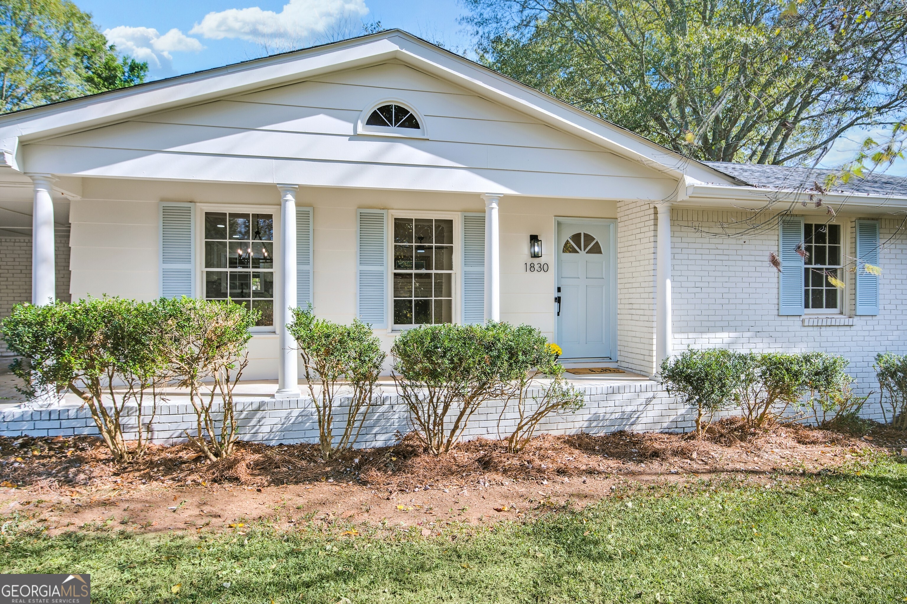 Downtown Alpharetta under $1M! Welcome to 1830 Mayfield! This 3-bedroom, 2-bathroom ranch located less than a mile from all that Alpharetta has to offer has been beautifully updated. This delightful 4-sided brick home features a modern, open floor plan that seamlessly combines living and family room spaces. Step inside to discover a fresh palette, highlighted by new interior and exterior paint, larger baseboards, luxury vinyl plank flooring throughout and so much more. New board and batten feature wall in family room and shiplap added to guest bath. The heart of the home boasts stunning quartz countertops in both the kitchen and bathrooms, complemented by new bathroom tile and an enlarged master bath featuring a spacious walk-in shower and contemporary vanity. Modern updates include all-new stainless-steel range, dishwasher, and microwave as well as stylish lighting fixtures, added can lighting, and a ceiling fan for comfort. Relax in the inviting 3-season porch or take advantage of the large, flat yard, perfect for gardening with pre-made planters. Two backyard sheds provide ample space for outdoor equipment storage. With these thoughtful updates and prime location, this home is ready for you to make it your own! Enjoy convenient access to Alpharetta's diverse array of shops, restaurants, and entertainment. Don't miss this incredible opportunity to own a piece of Alpharetta!