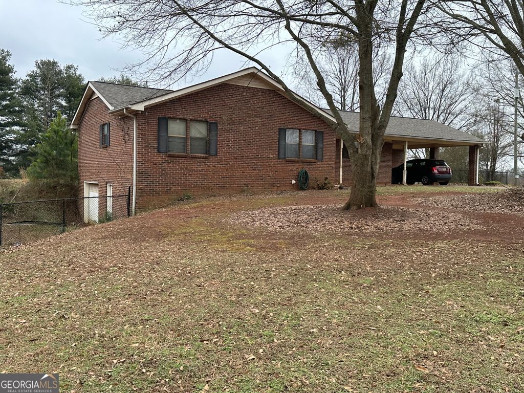 Photo of 11306 Panhandle Road, Hampton, GA 30228 (MLS # 10720458)