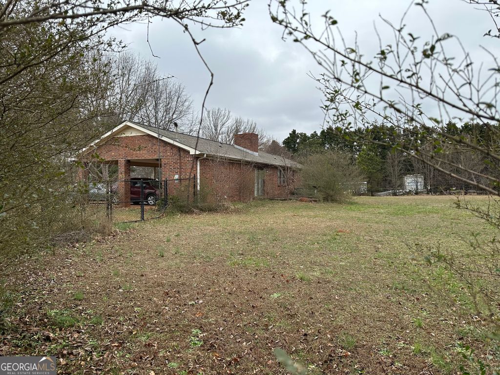 Photo of 11306 Panhandle Road, Hampton, GA 30228 (MLS # 10720458)