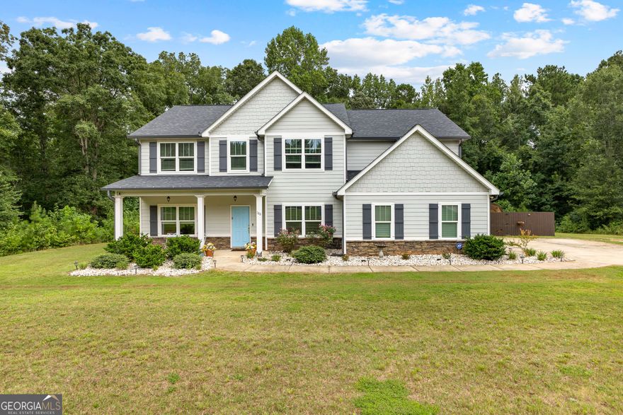 Enjoy peaceful country living with modern comfort in this like new home on almost 3 acres. It's so warmly decorated you will want everything to stay.  The large fenced backyard is perfect for your pets or your growing family.  This home brings all the best of country living yet, so close to the interstate.  If you've been dreaming of a small piece of land with a home that offers lots of space to grow you've found IT!