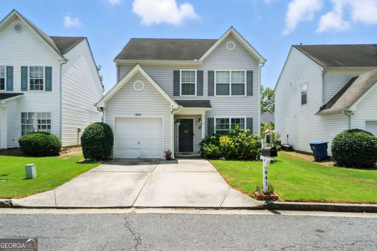 This beautifully updated 4-bedroom, 2.5-bathroom smart home in the Springlake Cove sudbivision offers 1,593 sq ft of thoughtfully designed living space with new flooring, a cozy gas fireplace, and a large master suite featuring vaulted ceilings and a spacious bath with dual vanities, soaking tub, and separate shower. The kitchen includes a gas range, dishwasher, and disposal, with the laundry area conveniently located nearby. Outdoors, enjoy a private backyard with a gazebo and raised garden beds-both included in the sale-plus a patio perfect for entertaining. The property has a 1-car garage and is located just 10 minutes from Highway 316 for easy commuting, while being zoned for highly rated schools.