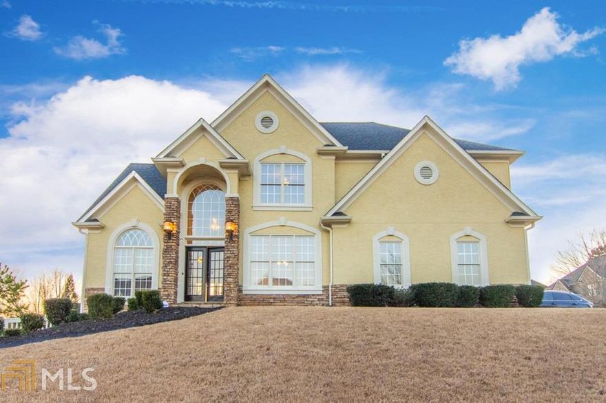 Lovely 4 bedroom, 2.5 bathroom home with a two car garage in desirable Bridgemill. Gorgeous kitchen includes a breakfast area, tile backsplash, stainless appliances, and granite counters. Fireside family room. Bridgemill is an active swim, tennis & golf community. Conveniently located near I-575, near abundance of shopping and Lake Allatoona.