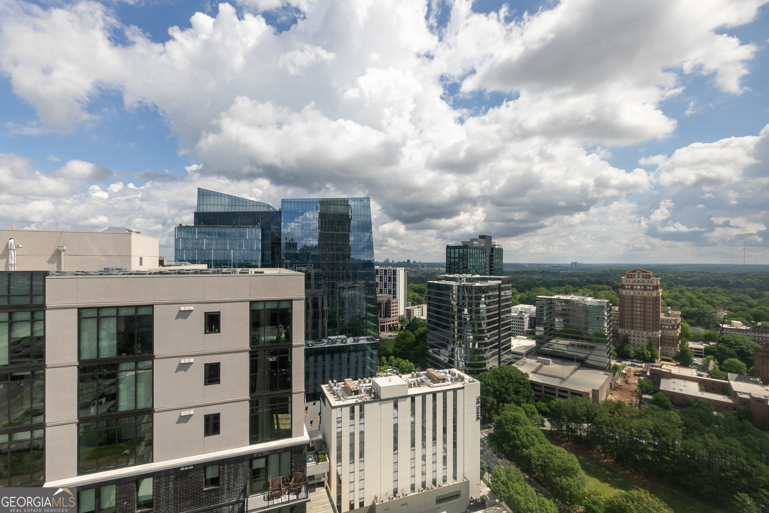 Life at the Top | 1280 W Peachtree St NW #3602 | Midtown Atlanta Wake up 36 stories above the city in this bright, modern 1-bedroom condo where the skyline stretches to Stone Mountain and every sunrise feels like a reset. Whether you're commuting to Google, Georgia Tech, or SCAD, your day starts effortlessly with Arts Center MARTA Station just across the street. No traffic. No stress. Just easy access to work, classes, events, and everything Atlanta has to offer. After work, your choices are endless: * Jog the rooftop track with the skyline as your backdrop * Unwind in the sauna or hit the well-equipped gym * Fire up the grill on the rooftop for dinner with friends * Challenge a neighbor to a game of tennis, basketball, or racquetball * Or take a dip in the rooftop pool as the sun sets over the city Inside, Unit 3602 offers a move-in-ready, low-maintenance home with granite countertops, stainless steel appliances, and open living with floor to ceiling windows that flood the unit with natural light. Where You'll Go (All on Foot or MARTA): * 7 min to Whole Foods * 10 min to Colony Square (dining, IPIC, Politan Row, events) * 10 min to High Museum of Art * Just across I-75 from Atlantic Station * Easy MARTA ride to State Farm Arena, Mercedes-Benz Stadium, Georgia State, and Downtown Perfect For: *Anyone looking for vibrant city living with low maintenance ease *Those who value walkable access to transit, shopping, dining and greenspace *Buyers needing quick access to universities, corporate hubs, or cultural hotspots *Homeowners seeing a lock and leave lifestyle with resort style amenities Bonus Features: * 4-hour concierge, secure gated parking * Free guest parking * FHA/VA approved * Pet-friendly community * Business center, billiards room, BBQ area This is more than a condo-it's your launchpad to everything Atlanta offers. Lock-and-leave convenience meets the best in Midtown culture, convenience, and connection. Rental cap met with long waitlist (no STRs)