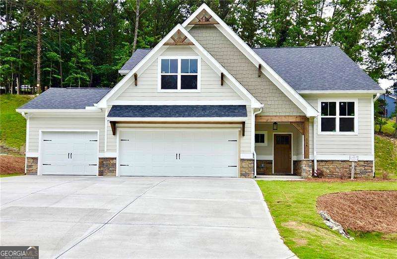 Move-In Ready!!! Great Master on Main Plan with 3 Car Garage! Charming Covered Front Porch on Full Unfinished Basement! 3 Bedrooms 2 Bath Open Floor Plan, Rear Covered Deck with Beautiful Wooded Mountain Views, Gourmet Kitchen with Granite Counters and Loads of Cabinet Space. Private Master Suite with Double Vanity, Walk In Closet and Spacious Shower.