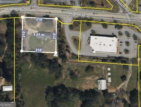 This 1 Acre Lot fronts an additional 48+ acres that the owner would be willing to subdivide to make suitable for your needs. Conveniently located just outside of the city of Douglasville allowing for potential developers to become creative. The other parcel is being listed separately as a assemblage that is suitable for a Mixed Use Development with Hundreds of Townhouses. A sewer line is located next door where we have an Easement. And, a lift station would be allowed in order to maximize density. Property does have a Power Easement that makes a little over 10 acres undevelopable and a creek that would require a buffer.