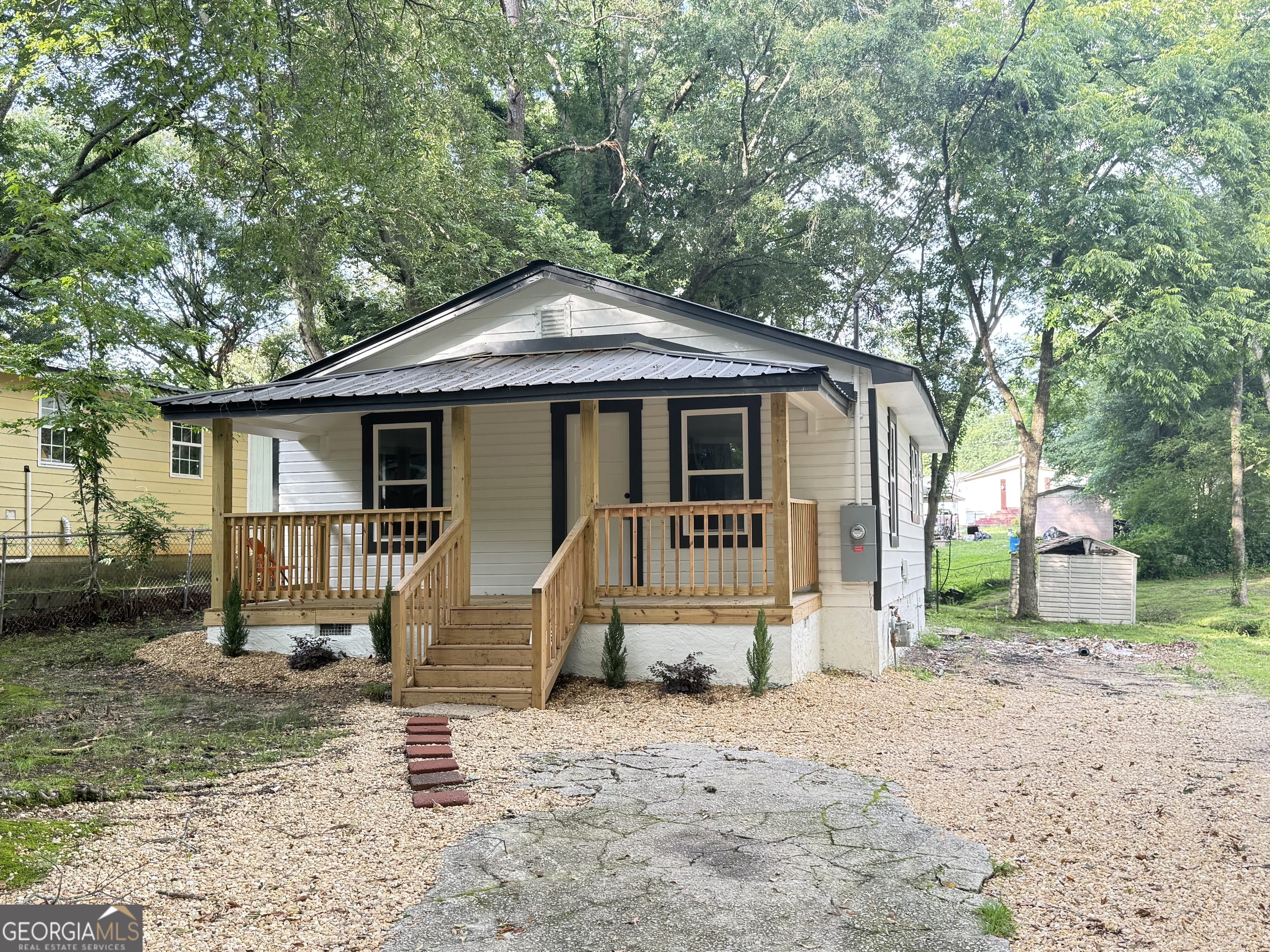 If you're looking for a great starter home, look no further! This just remodeled 2 Bed/1 BA Ranch home in the heart of Gainesville has all you need! Beautiful front porch. All new flooring, new kitchen cabinets and new appliances. All electrical has been replaced and new windows install throughout. Sunroom and/or Family room could easily be converted into a third small bedroom. Price hard to find. Dont miss this great opportunity!