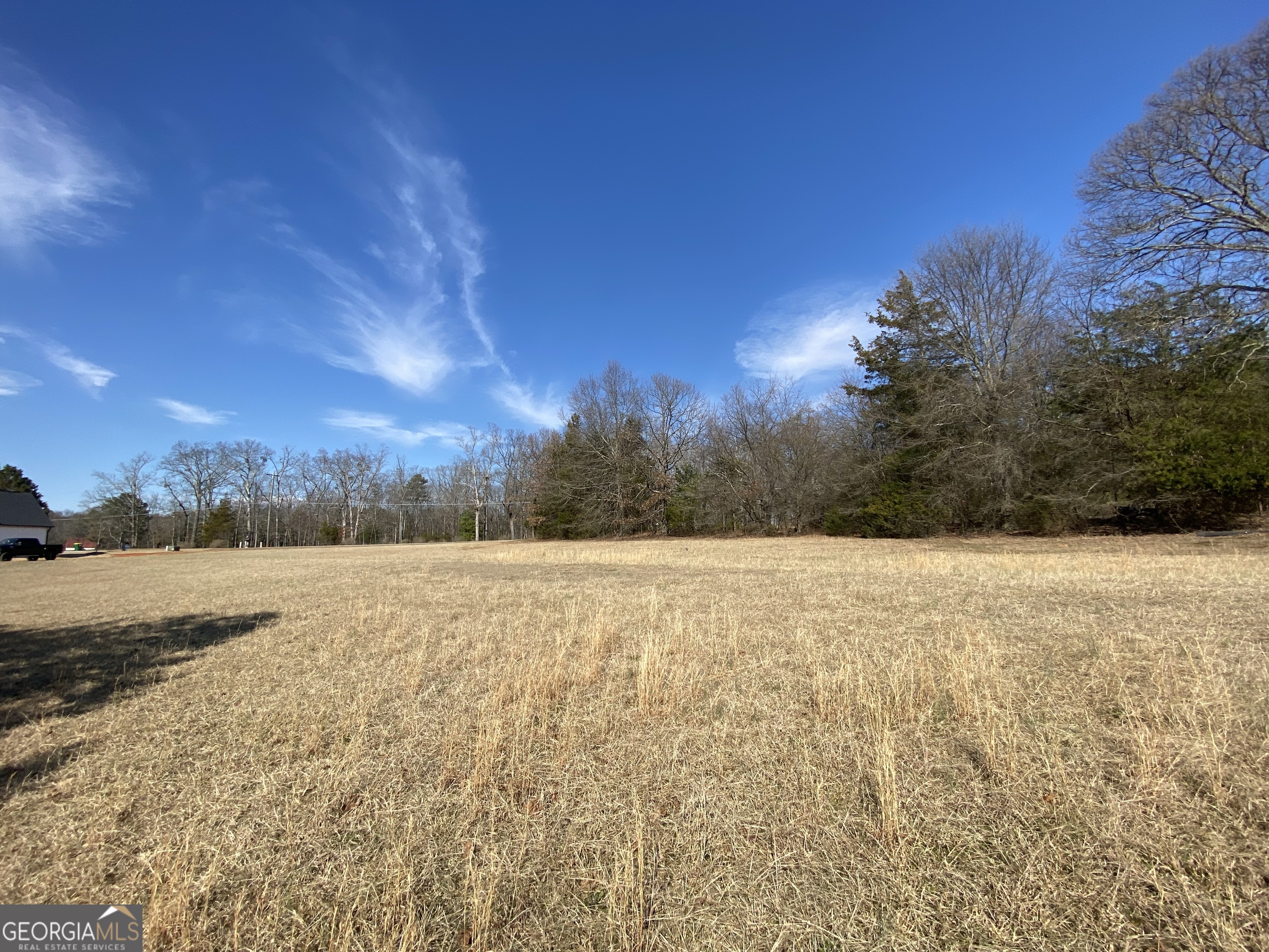 Majestic Shores is an upscale subdivision of newer homes in the sought-after Carter's Ferry area of the lake. You will have easy access to shopping and restaurants in the town of Hartwell. Lakefront and interior lots are available. The lakefront lots have private docks in place and each interior lot includes a private covered slip in the community dock. All of the lots have easy build sites and some are already cleared. The developer is also offering lot/build packages. Lot 13 is .50 acre in size.