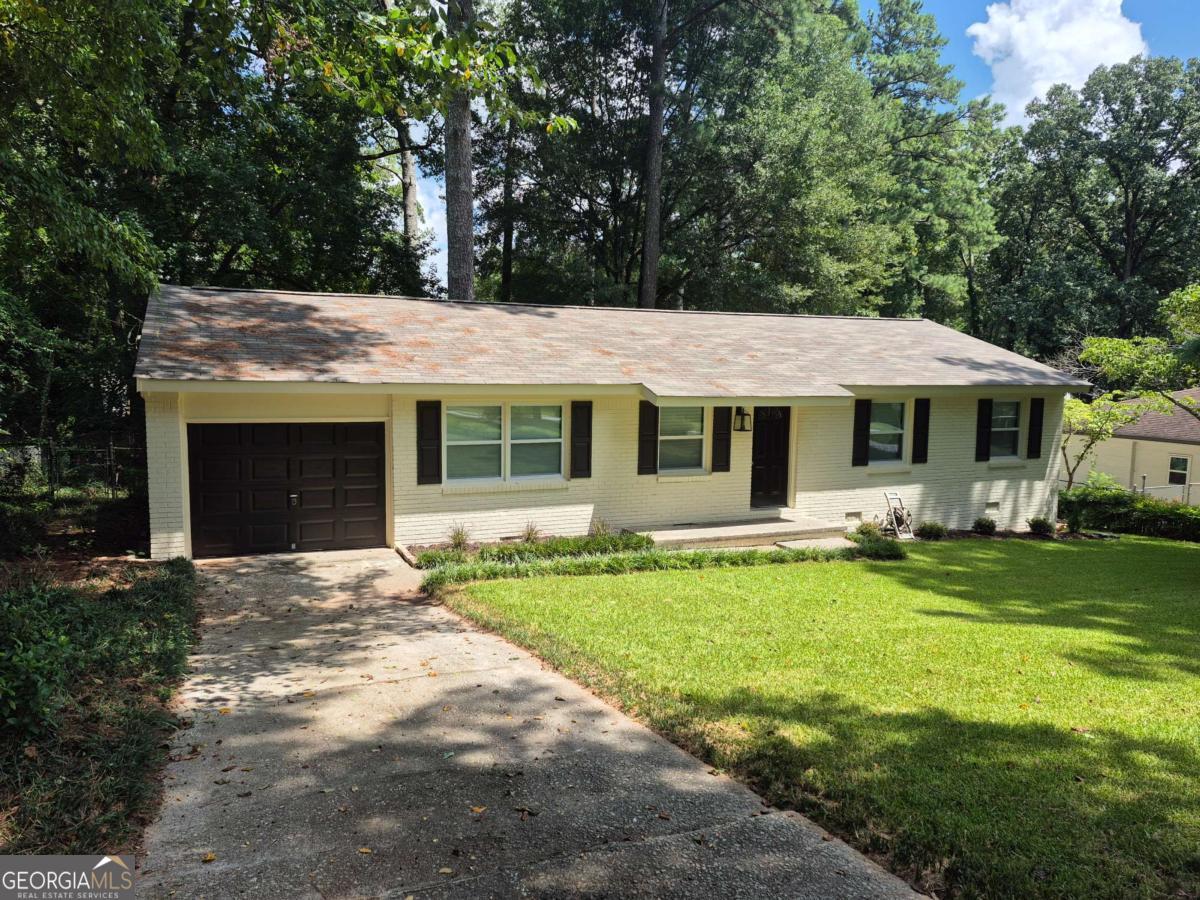 excellently Renovated 4 SIDED BRICK RANCH! Everything NEW! dream kitchen with humongous granite Island! New real Hardwood floors, new bathrooms, New Stainless Steel appliances, new Deck,NEW ROOF, new windows, new tub and showers new tile bath, overlooking large fenced backyard. all New light fixtures.