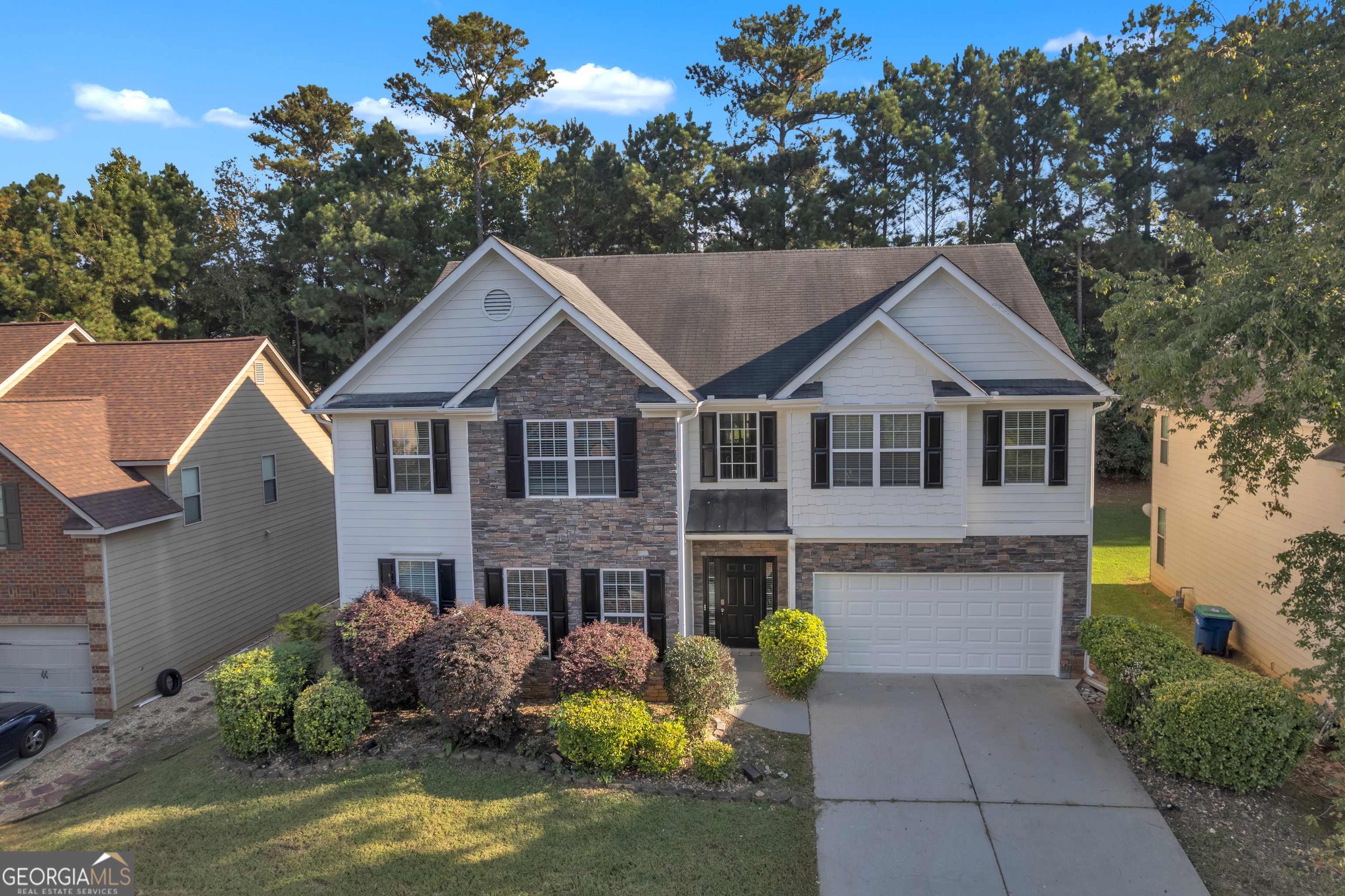 Beautifully updated 5-bedroom, 3.5-bath home in the sought-after Lakes at Cedar Grove community! This spacious home features fresh paint, new flooring, and stylish granite countertops. The main-level primary suite offers a bright retreat with cathedral ceilings, walk-in closet, and a spa-like bath with dual vanities, tiled shower, and garden tub. The kitchen shines with white cabinets, new backsplash, and stainless steel appliances, perfect for everyday living and entertaining. Upstairs you'll find four large bedrooms, a huge loft, and a convenient laundry room. Enjoy resort-style amenities including lakes for fishing, walking trails, pool, clubhouse, playgrounds, basketball, and volleyball courts. With no rental restrictions, this home is ideal for both owners and investors!