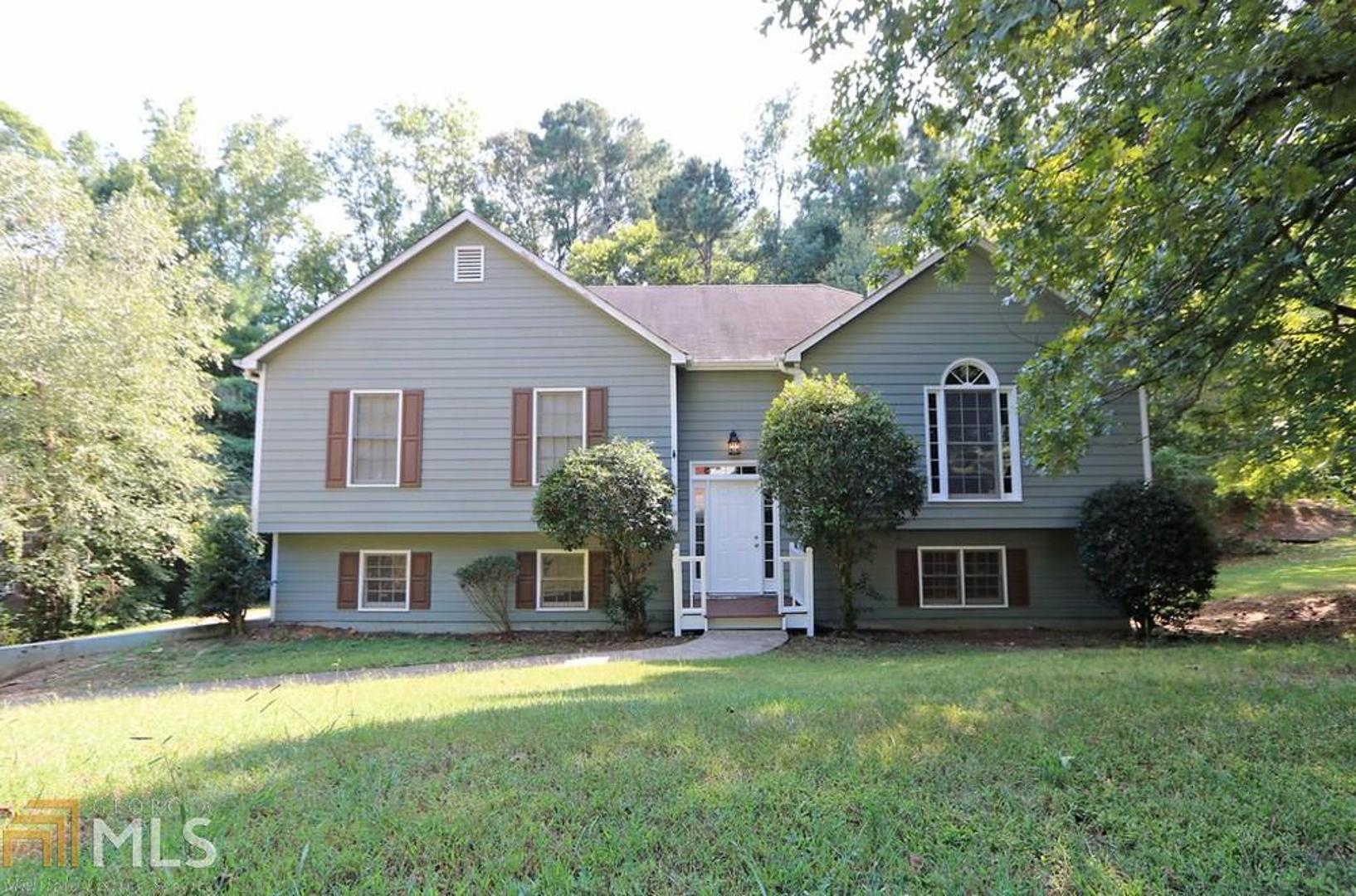 Recently renovated home with new paint, flooring, lighting, and granite counters in kitchen and all baths! Large welcoming family room with fireplace and vaulted ceiling. Kitchen features new granite countertops and dining room connected to the recently stained deck. Master bedroom with walk-in closet, garden tub, separate shower, updated vanity with granite countertop. Oversized bonus/recreation room in basement large enough for a pool table with bar/sink area. Oversized side entry two car garage. Spacious level back yard with plenty. Heating and air system 2 years old!