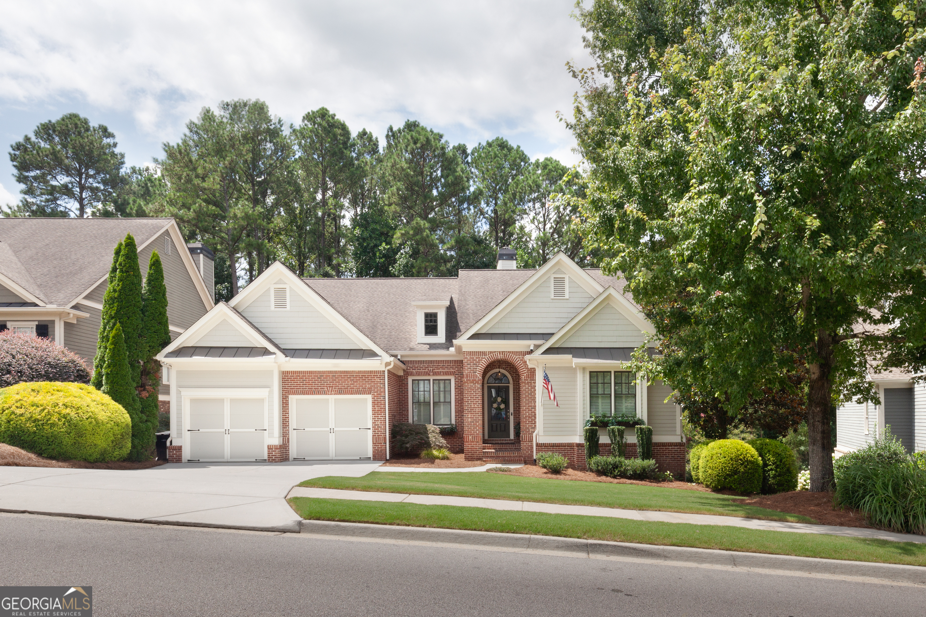 Looking for a Multi-Generational Home in the prestigious Bentwater Subdivision in the charming city of Acworth? This is it! This home offers so many options for large or extended families! Step inside to a well-maintained home with a top-of-the-line remodeled kitchen, a truly a culinary masterpiece with custom cabinetry, high end appliances, designer countertops and loads of storage. In the designer kitchen you will find a bar area that holds a wine cooler and as well as a separate cold drink cooler. The kitchen is huge and has a spacious sitting area with large glass windows so you can have your coffee and watch the birds in the private wooded backyard. Off the kitchen you will find a beautiful dining room, laundry room with cabinetry as well as the half bath. Finishing out the Main level you will find the family room, complete with newly installed gas logs for fireplace and interior window shutters, Master Ensuite with separate Tub and shower, 2 more bedrooms and a full bath! Upstairs you will find a teen suite complete with a bedroom and full bath, not to mention a huge walk-in attic storage! Downstairs is a complete apartment! 2 bedrooms, with option for a 3 bedroom, newly completed full bath as well as full kitchen with new upper cabinets, built in oven and microwave, large family room with built in's, office or workout room, and newly installed laundry area! Room for extended families in this house! Loads of more unfinished storage space to complete to your desires! Looking to the Exterior you will find a manicured lawn with sprinkler system, as well as a screened porch and deck off back of house with brick patio underneath. Bentwater Community offers the perfect family lifestyle, with the fabulous golf course, with private dining, 5 pools (1 of which is just 5 doors down!) tennis courts and pickleball, hiking trail and playgrounds! Just minutes from Lake Allatoona, the huge Lakepoint Sports Facilities and downtown Acworth with all the wonderful dining options! This home has been meticulously updated and maintained, offering a perfect example of luxury, comfort and function! Schedule a showing before it's gone!
