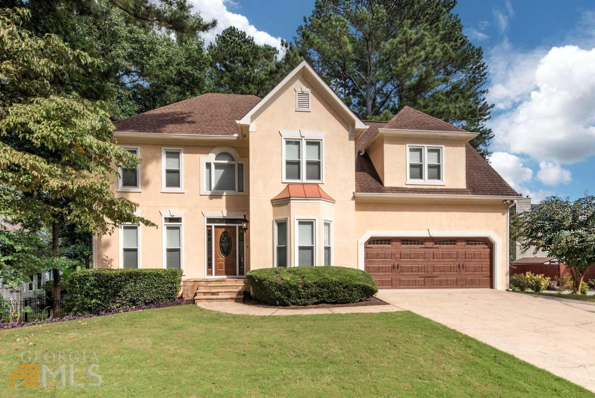 Welcome home to this great opportunity in Arden Trace. The two-story Foyer opens to a separate Living Room perfect for a home office or playroom and separate Dining Room. Large fireside Family Room with lots of natural light. Great Kitchen with Island, granite counters, stainless steel appliances including a double oven. Spacious primary suite upstairs complete with spa-like bath features separate vanities with whirlpool tub and tile surround. Three large guest beds and guest bath with double vanities complete the upstairs. Full finished basement is perfect for entertaining or staying in with home movies complete with full bath (both TVs to remain). Relax on the large deck overlooking the private backyard, perfect for family gatherings or throwing a football. Mud room, upgraded motorized blinds, additional storage and more! Enjoy the great amenities Arden Trace has to offer with pool, tennis and playground. Great schools and close to shopping and interstate.