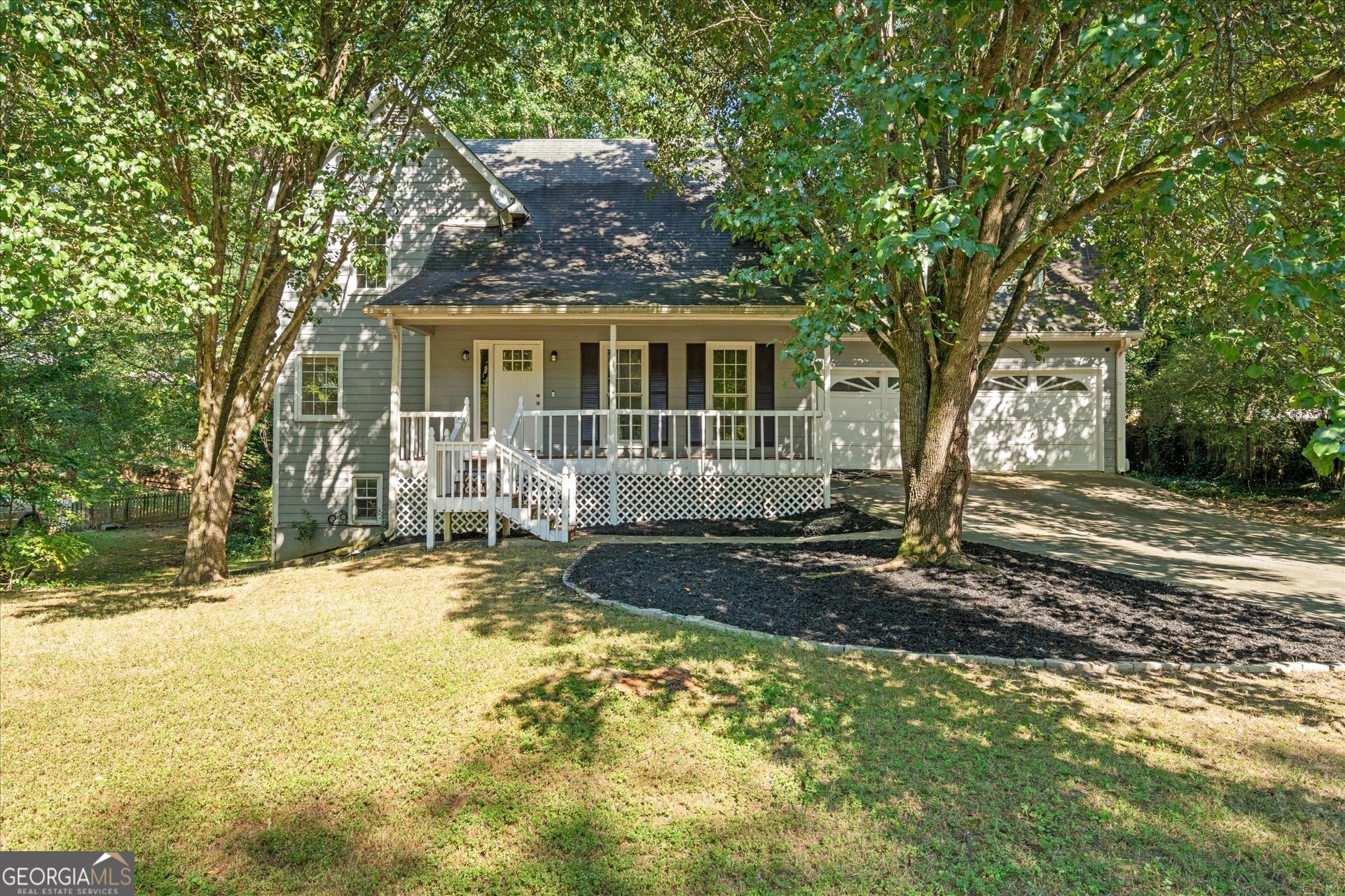 Dont miss this charming 2 story home in the heart of Cobb County! NEW renovations in the master bath, kitchen, and many more areas in the home! Upon entry, you are greeted with the warmth of a central fireplace in a huge den/family room. This will take you to the kitchen as well as a full dining room with a stunning view of the backyard. On the right side, you will find a full separate laundry room with hidden stairs leading to a bedroom upstairs for easy access! Upstairs, you will find 3 bedrooms, with also a potential office space, and a large playroom in the center! The home also has a great partially finished basement that simply needs some finishing touches. Great great home in the best school district!!