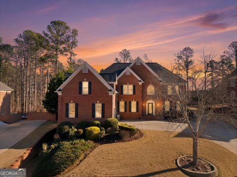 Photo of 1121 Hiddenbrook Lane, Suwanee, GA 30024 (MLS # 10677628)