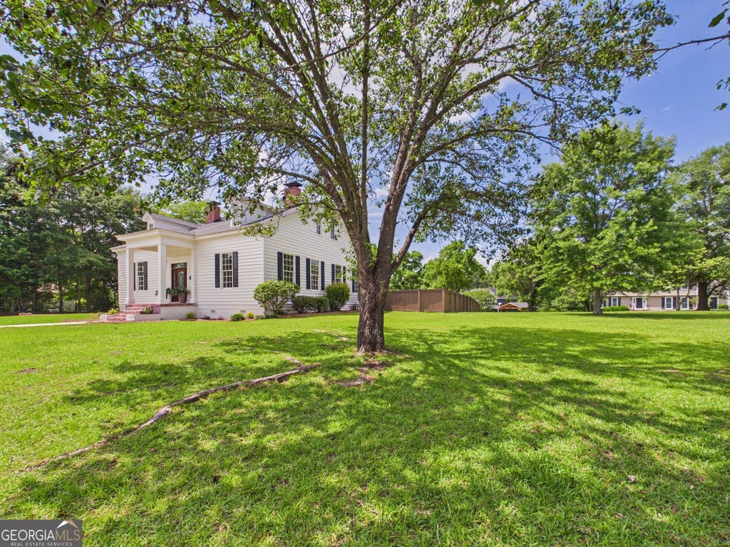Photo of 6309 Mansion Drive, Macon, GA 31216 (MLS # 10779157)