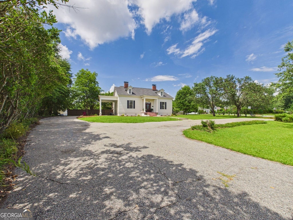 Photo of 6309 Mansion Drive, Macon, GA 31216 (MLS # 10779157)