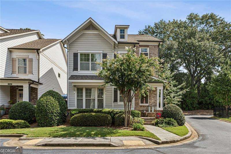 Come see this gorgeous craftsman style home in the heart of Williams Park in Smyrna! Step into an open concept living/dining/kitchen area flooded with natural light and beautiful wood floors. The living room features a gas fireplace and leads right into the kitchen with an oversized island and granite counter tops. The cook in your family will love the double oven, gas cooktop, and generous pantry space. French doors with sliding screens lead to the side courtyard where you can grill and entertain around the firepit. The second level features a large primary suite with wood floors, his and hers walk-in closets, double vanity and shower. Two more bedrooms with a jack n jill bathroom and a laundry room are also on the 2nd level. The third level has another bedroom and full bathroom which could serve as a guest room, office, workout room or whatever you dream up! Recent updates include exterior paint (past 2 years), and AC units replaced (one in 2024 and one in 2025). Enjoy a short walk to The Five featuring Ruby's Pizza and Ruby's Coffee or the Smyrna Market Village. The Battery and highway access are just a couple miles away.