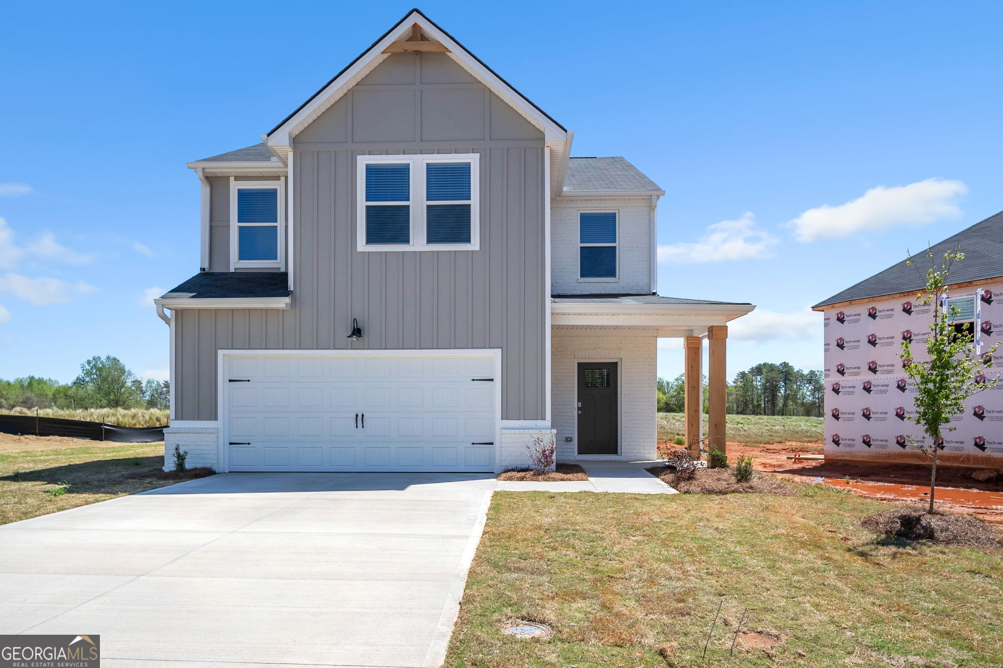 You'll love the inviting design the Madison plan offers. The entrance leads you through the foyer and into the open family room and dining area. The kitchen provides abundant counter and cabinet space , plus an island. Upstairs you'll find three bedrooms, a full bathroom, a sizeable laundry room, and the primary suite with a private bath. Don't overlook the 2 car garage and plenty of storage space added throughout. Tile shower, Soaking tub, smart toilet, LED Bluetooth mirrors in the primary bedroom, granite throughout, vessel sinks, blinds, screens, and gutters. Come see many more additional features.