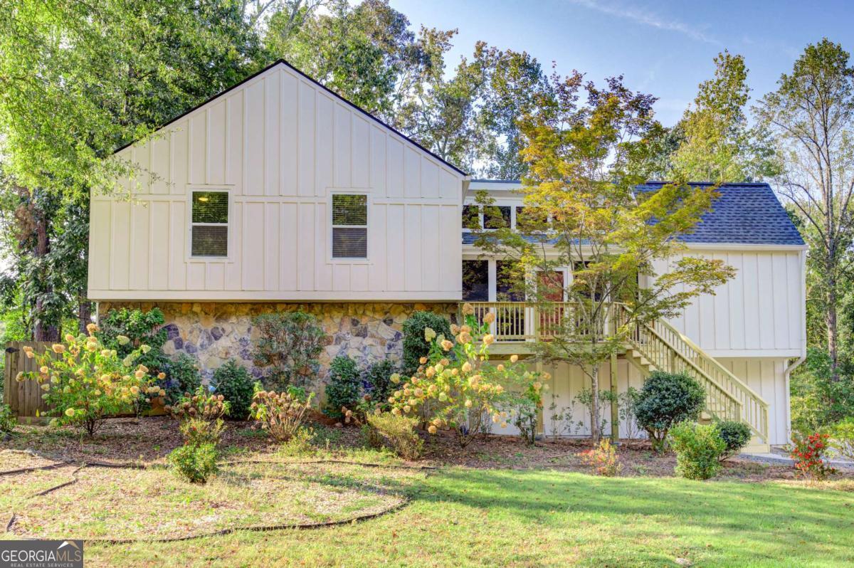 Totally updated renovated home in sought after Newcastle in the Pope High School district. The home is located on a quite private Cul de sac with an oversized level lot featuring a fenced backyard. Bright sunny spacious home with many upgrades making the home move in ready. Unpack your items and welcome home! Newer water heater, landscaping, fence, and garage door. The HVAC, roof, air/water purification system, and siding all replaced and installed very recently. The front porch and back deck have just been completely redone. The beautiful hardwood floors on the main level of the home enhance the cozy fireplace which looks out to the back deck. The kitchen and bathrooms were remodeled to give the home the updates needed to modernize the appearance of the home. The bedrooms are oversized with storage. The terrace level bedroom is large and very private with an on-suite bathroom. The back deck is off the main level making it very easy for entertaining guests or enjoying a beverage outdoors while watching the sun rise or set. There is a patio area off the terrace level makes for a perfect outdoor space with room for grilling, outdoor games, and gathering which enhance the outdoor living space. The 2 car garage is oversized with plenty of room for storage. Close to shopping, dining, entertainment, top notch public and private schools. Close to both GA 400, and I-75, with easy access to downtown Roswell, Woodstock, and the Chattahoochee Recreation Area. This quiet neighborhood creates a perfect environment for walking with neighbors or pets. Newcastle homeowners can join the adjacent neighborhood amenities in Arthur's Vineyard which include swim and tennis. Don't miss the opportunity to tour this charming home and experience the welcoming community of New Castle.