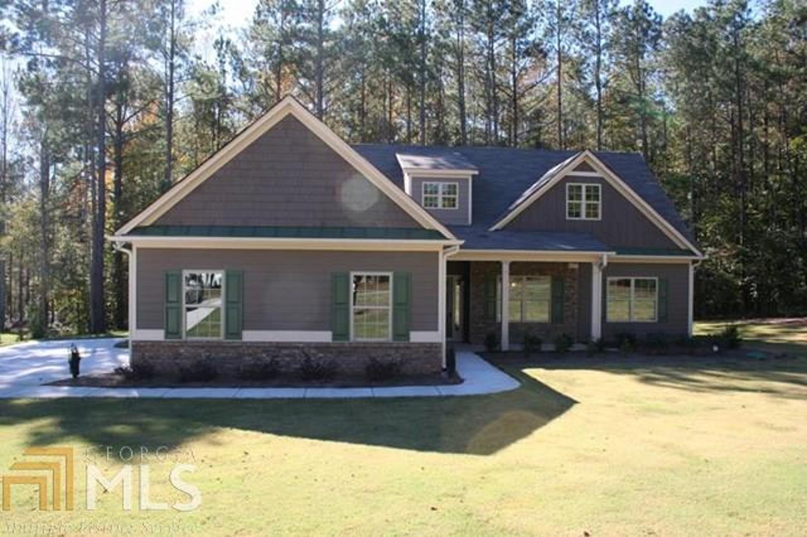 Lovely new ranch, move in ready on 1.5 acres in a Jackson County premier developments. Convenient to I-85 or Athens. This house has 3 bdrms, 2 baths on the main and another bonus/bedroom with full bath up. In addition to the separate formal dining room, there is the lovely family room which is open to the kitchen and breakfast room, great for family gatherings or entertaining. The kitchen has granite counters and stained cabinets. Relax on the rear patio overlooking beautiful hardwoods, lots of privacy. This unique property is great for a family or folks looking to downsize.