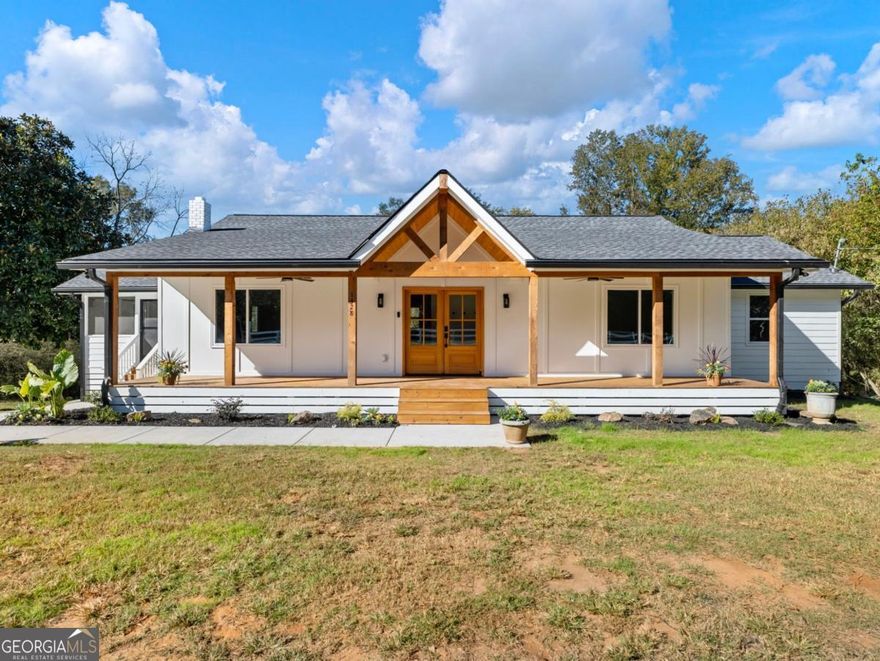 Welcome to this immaculate new renovation off Jefferson Highway in Winder! There has been no stone left unturned on this property. From the moment you step onto the property you can feel the warmth and attention to detail that went into making this home! Sprawling over 2.3 acres this home has enough room for growing families and entertainers alike. The main level boasts 3 bedrooms and 2 bathrooms carefully renovated to blend the classic cozy home feel with a  modern charm. The bottom basement level has been outfitted with a full bedroom and bath, brand new kitchen and bonus room perfect for in laws or an entertainment space perfect for game day! Outside you will find a brand new back deck and side screened porch dedicated to those classic Georgia fall nights by the grill or that morning cup of coffee! This property is just waiting on YOU to call it, HOME