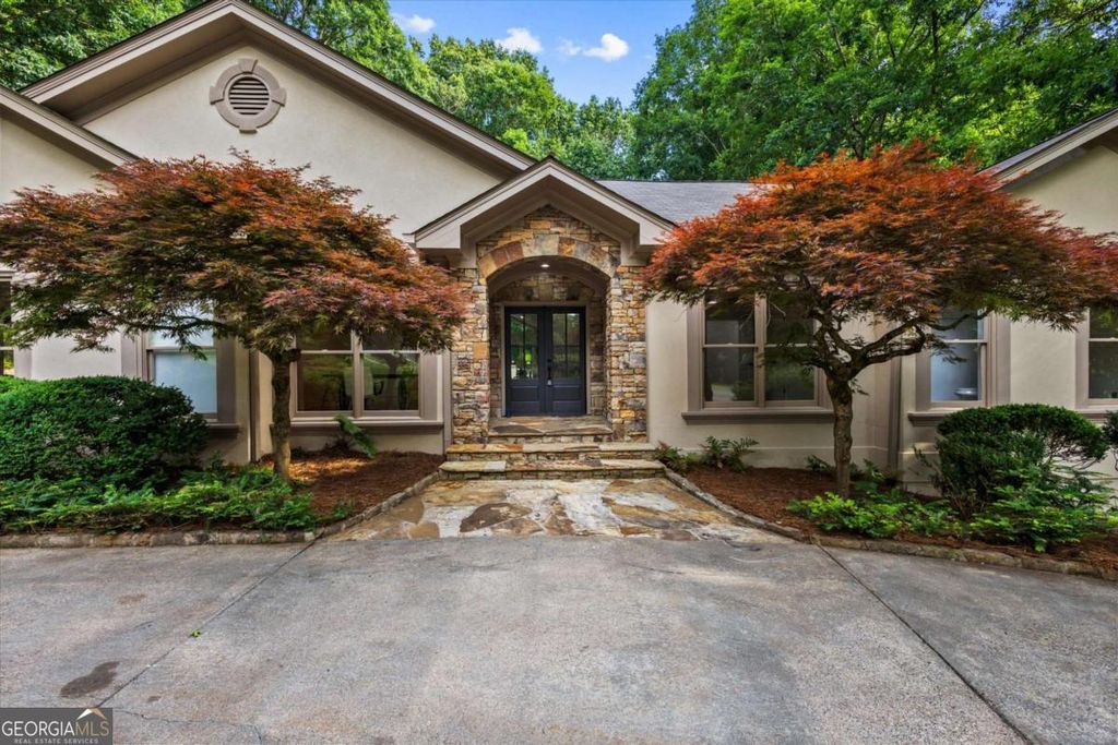 Photo of 8920 Huntcliff Trce, Atlanta, GA 30350 (MLS # 10785692)