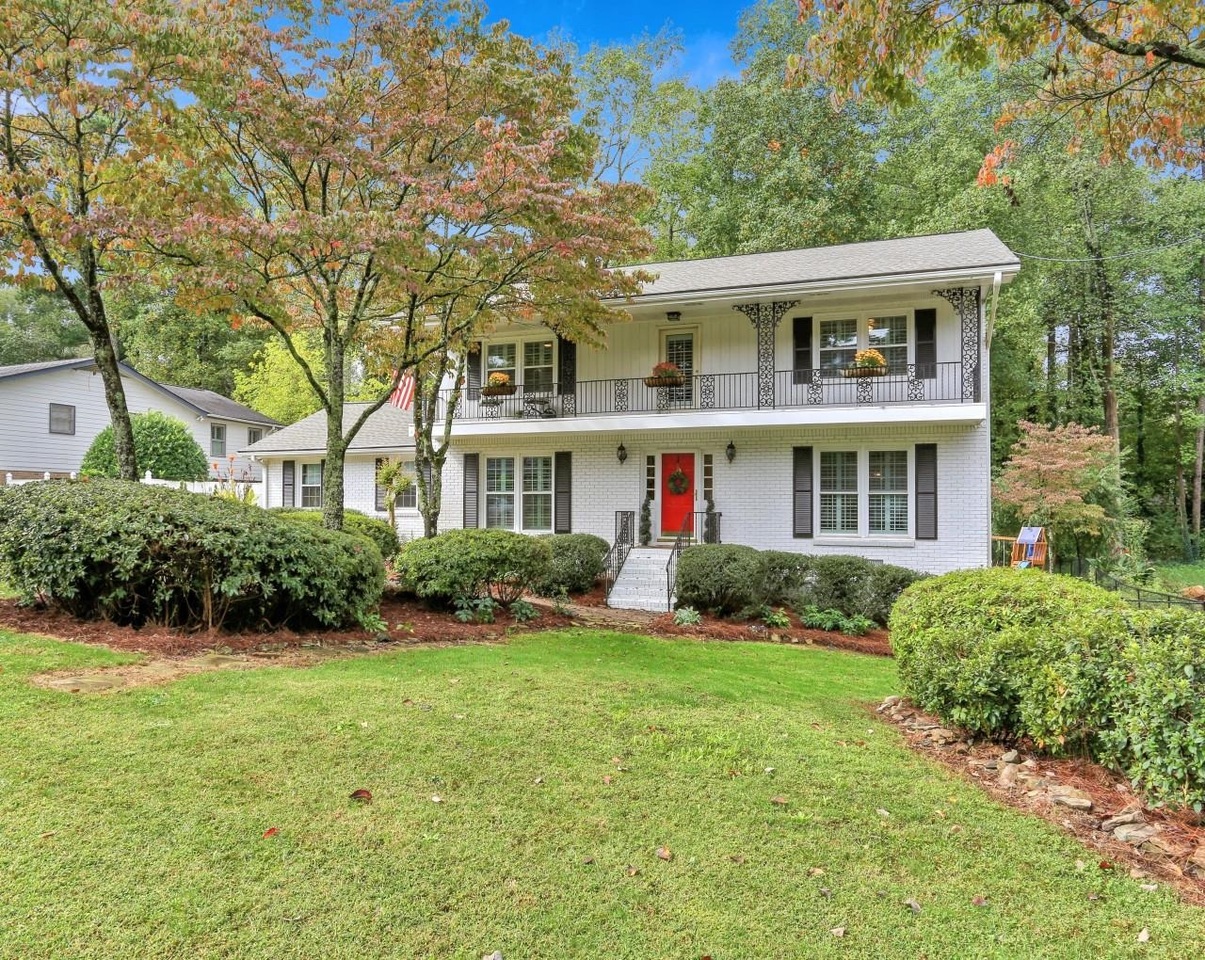 Welcome home to a beautiful non-traditional Dunwoody home with sunny outdoor spaces; you'll want to live in it for the rest of your life. This three-sided brick sunfilled colonial has everything you need and then some. If you're looking for something different, then you've found it! Located in one of the most desirable neighborhoods in Dunwoody, this charming home is perfect for anyone looking to be close to the highly anticipated Dunwoody Village redevelopment. It also boasts new HVAC, Roof, and Windows. In addition, it effectively has two kitchens with two sinks and two dishwashers for busy families or anyone who likes to entertain! Enjoy your morning cup of coffee on the front porch or evening cocktails on your back deck that overlooks the secluded, well-manicured backyard. EXTERIOR FEATURES: three-sided brick, rear entry garage, sizeable bi-level backyard, firepit area, garden, large deck, second-story front porch, fenced-in yard, new roof, new HVAC. INTERIOR FEATURES: entrance foyer, dental crown molding, upgraded custom molding throughout, upgraded 5 1/4 baseboards, built-in bookcases, hardwood floors throughout, custom white cabinets, custom built-in pantry/storage, granite countertops, stainless steel appliances, double oven, two sinks, two dishwashers, built-in wine rack, island, recessed lighting, full finished basement with bathroom, ample storage, plantation shutters, new windows, tile bathrooms, new lighting, double vanity, and much more!Make an appointment today; this home will not disappoint!