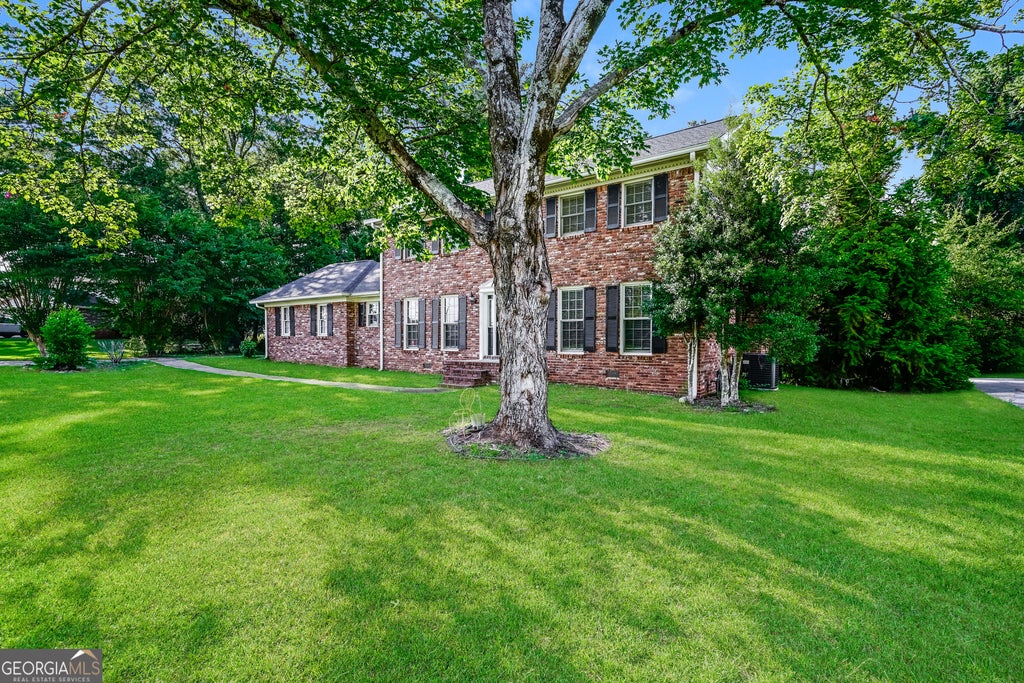 Photo of 2216 Country Club Drive SE, Conyers, GA 30013 (MLS # 10806349)