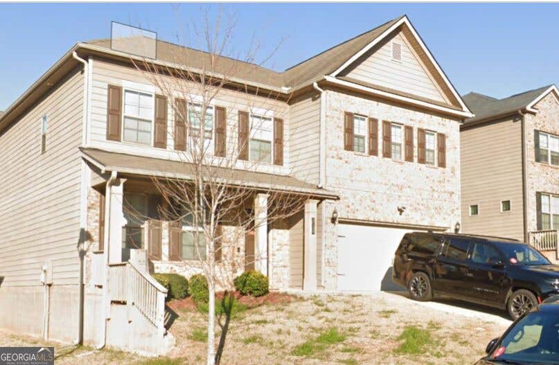 Photo of 2138 Dodson Woods Drive, Fairburn, GA 30213 (MLS # 10832091)