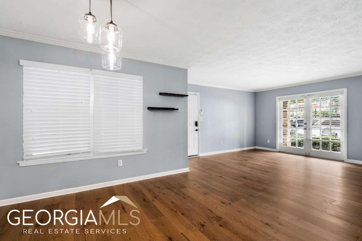 This stunning 1 bedroom, 1 bathroom property in the gated, FHA-approved community of Collier Green has desirable updates & upgrades as well as great building amenities minutes in the heart of West Midtown. Step inside and be greeted by brand new flooring and new paint, creating a fresh and inviting atmosphere throughout. Enjoy your own little outdoor area through the french doors to your left. The kitchen has been tastefully updated with a farmhouse sink, stainless steel appliances, and a new dishwasher. The bedroom highlights are an amazing accent wall and custom closet shelving to maximize storage space and ensuring organization is a breeze. The laundry is in-unit a right across the bedroom equipped with a new front load washer and dryer and a new hot water heater. Donat miss the amazing amenities! A sparkling pool and a volleyball court await your enjoyment, providing opportunities for leisure and relaxation. When the fitness center reopens after the renovations, you'll have access to a well-equipped facility, perfect for maintaining an active and healthy lifestyle. Pet lovers will be delighted to know that this community is pet-friendly with its own dog run. A short walking distance away, you'll find a grocery store, making shopping a breeze. The neighborhood is surrounded by popular breweries, restaurants, Top Golf, and exciting entertainment options like Chattahoochee Food Works and West Provision District. Midtown is also only a 10 minute drive away!