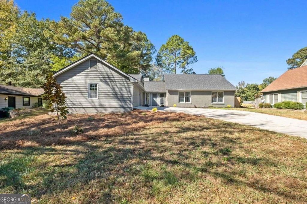 Photo of 1603 Golf Link Drive, Stone Mountain, GA 30088 (MLS # 10630346)