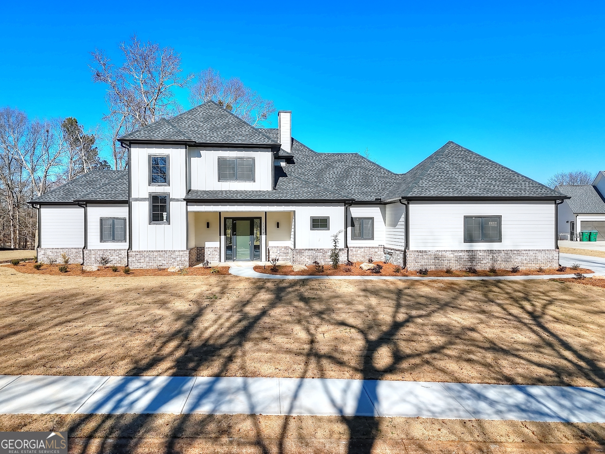 Beautiful new construction home located in the prestigious Sandy Creek Golf Course community! This 4-bedroom, 3 bathroom home is thoughtfully designed to offer both luxury and functionality. The chefs kitchen is a highlight, featuring quartz countertops, a beautiful tile backsplash, stainless steel appliances, and a convenient pot filler above the oven. Just off the kitchen, the spacious laundry room offers plenty of counter space and cabinetry for added convenience. The main level features a private primary suite, complete with a large soaking tub, double vanity, and a walk-in closet with custom built-in shelving. A half bathroom on the main floor adds extra convenience for guests. Upstairs, you'll find a Jack-and-Jill suite connecting two bedrooms and a shared full bathroom. An additional bedroom is located on the second floor, along with a half bath, providing flexibility and comfort for family or guests. Beautiful laminate flooring runs throughout the home, complemented by plenty of natural light, creating a warm and inviting atmosphere. Nestled in the serene Sandy Creek Golf Course community, this home offers a perfect blend of modern design and peaceful surroundings. Schedule your private showing today and make this dream home yours!