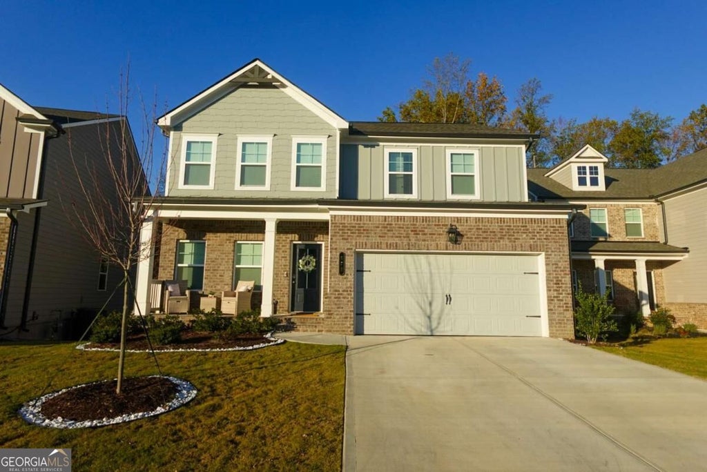 Photo of 573 Auburn Crossing Drive, Auburn, GA 30011 (MLS # 10836902)