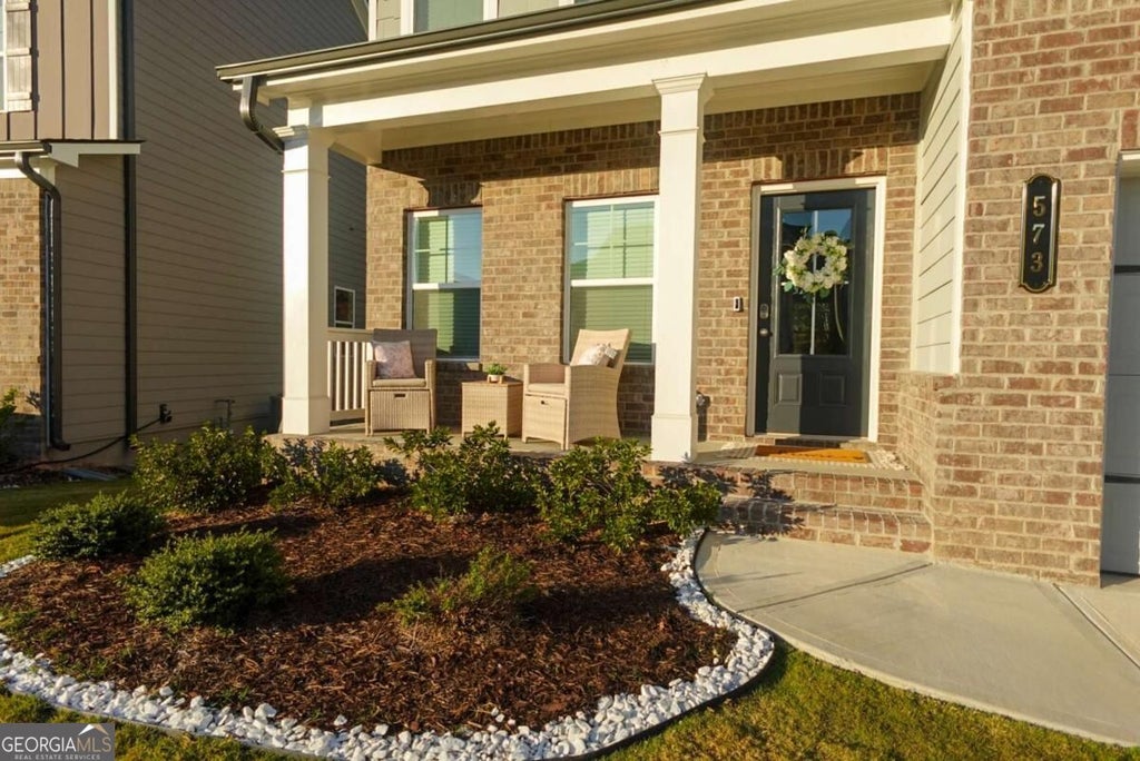 Photo of 573 Auburn Crossing Drive, Auburn, GA 30011 (MLS # 10836902)