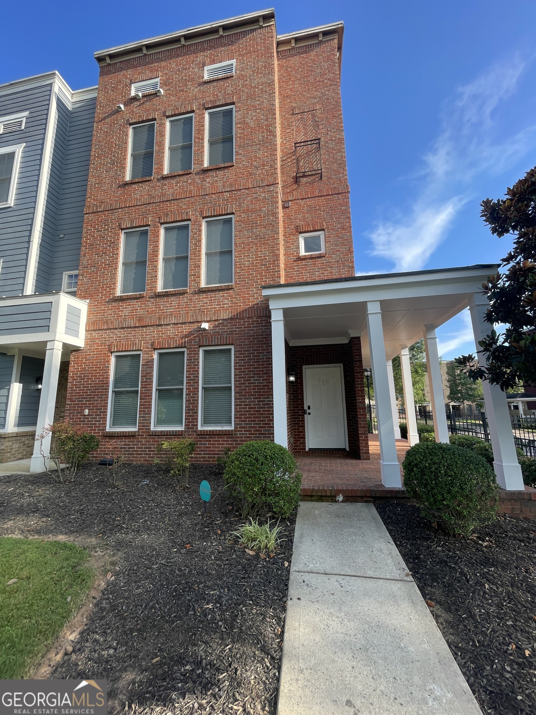 Stunning 3-story end-unit in prime downtown Atlanta location! This beautifully designed town home offers the perfect blend of style, comfort, and convenience. Featuring elegant 2-sided brick construction with stately columns and a partial wrap-around front porch, this home makes a lasting first impression. Inside, enjoy a spacious and open layout on the main floor that is spanned with wood floors and a kitchen with stainless steel appliances, a breakfast bar with unique pendant lighting, double-door pantry, and granite counter tops that seamlessly overlooks the expansive family room. Boasting a roommate-friendly floor plan, each bedroom features its own private full bathroom with every shower upgraded with modern stone finishes. The over-sized primary suite includes dual walk-in closets and a luxurious en-suite bath with double vanities, a stand-up shower, and a soaking tub. Additional highlights include a WASHER AND DRYER and 2-car garage for ample parking and storage all while located in a gated community with two easily accessible entrances. Step outside to a generous back deck making it the ideal place for unwinding or entertaining guests. Located in the heart of downtown Atlanta, you'll enjoy easy access to shopping, dining, entertainment, and major highways making this the perfect place to call home! APPLY NOW BEFORE IT'S GONE! Qualifications are as follows: Applicants must gross 3x the monthly rent ($8,700+). No previous evictions will be accepted. No bankruptcies, car repossessions or collections in the last 24 months will be accepted. Minimum one-year lease. Pets allowed with a $400 non-refundable pet deposit. $75.00 application fee for all occupants over 18 years of age. Professionally managed. No minimum credit score requirement!