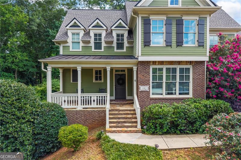 Welcome to 192 Chicopee Drive - Your Private Marietta Oasis Just Steps from the Square! Fall in love with this extraordinary, move-in ready home that combines luxury, location, and lifestyle. Nestled less than one mile from the vibrant heart of downtown Marietta, this stunning residence offers over 4800 square feet of beautifully finished living space-all without the restrictions of an HOA. Step inside to discover an open-concept main level designed for entertaining and comfort. A spacious family room flows effortlessly into a gourmet kitchen with views of your very own backyard retreat that includes a stone fireplace, lavish landscaping, an inground heated salt water pool that sets the scene for unforgettable outdoor gatherings and is your own resort-style private escape. Upstairs you'll find an oversized primary suite with large primary bath and three additional bedrooms and one full bath that provides space and privacy for family and guests. Downstairs, the fully finished terrace level features a full studio apartment with bedroom space, kitchen, living area, second laundry, storage, and its own walk-out patio area. This home is perfect for multi-generational living, guests, or rental income. The crown jewel of this home is the lush, fully fenced backyard. Professionally landscaped and designed for relaxation, it boasts a inground heated saltwater pool, stone paver patio, covered seating area, lawn space, and even a garden area - a true outdoor sanctuary. New Roof - 2023. New water heater - 2022. Generac whole house generator. Don't miss your chance to own this rare gem where luxury meets convenience in the heart of Marietta. Walk to restaurants, shops, festivals, and more. No worrying about parking at the square, just walk or bike over for all the activities on the Square. This home truly has it all!