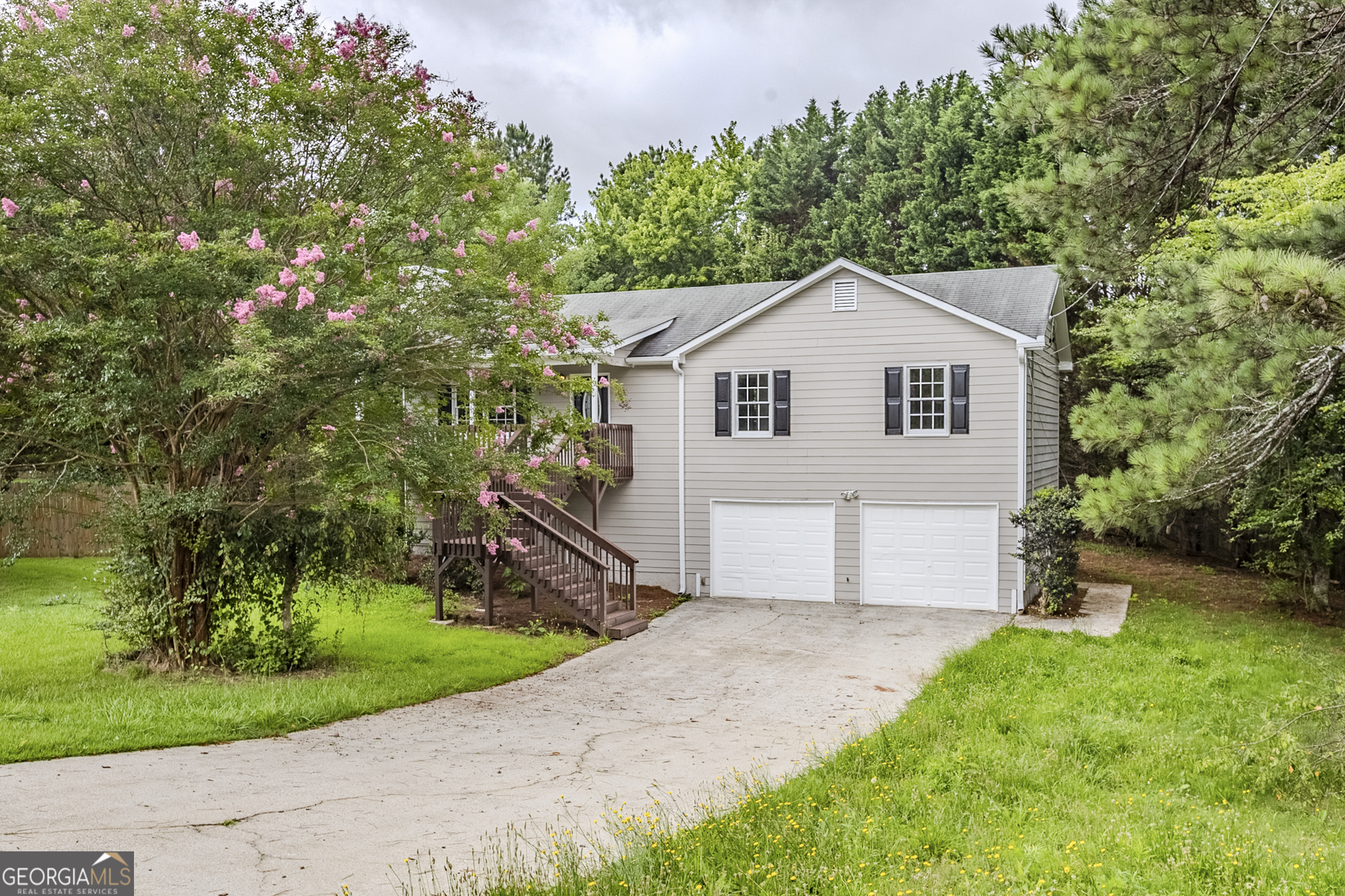 This charming 3-bedroom, 2-bath home features durable LVT flooring in the kitchen and bathrooms, with plush carpet in the bedrooms for added comfort. The kitchen and master bath boast freshly painted cabinets, complemented by sleek quartz countertops in the kitchen. Additional conveniences include a basement laundry area and garage entrance, offering practical and functional living throughout.