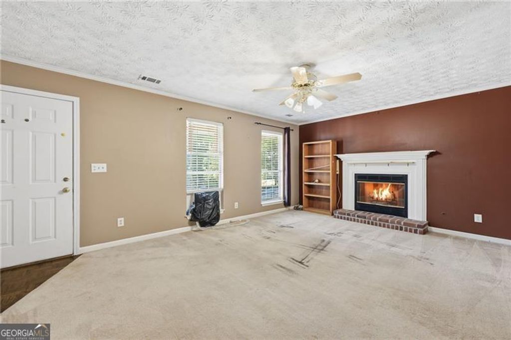 Photo of 3080 Ashly Cove Lane, Snellville, GA 30078 (MLS # 10739983)