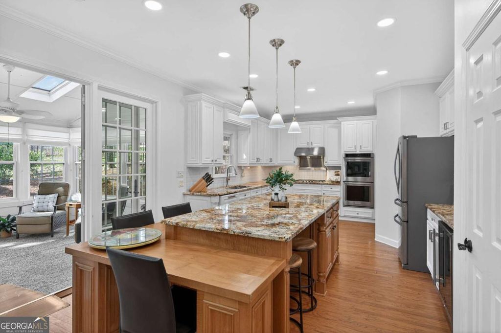 Photo of 6460 Rutherford Place, Suwanee, GA 30024 (MLS # 10709631)